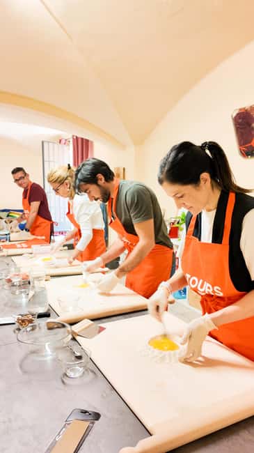 Bologna: Pasta Tagliatelle Ragu Cooking Class with Spritz - Wine toast and Parmigiano moment: Sangiovese at the table