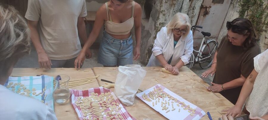 Lecce: Pasta Making Class in 1400s-Era Courtyard with Wine - Orecchiette in practice: shaping the sauce-catchers