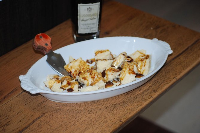 Make Homemade Pasta in Bologna with Professional Pasta Maker, Pio - Wines, conversation, and that warm local vibe