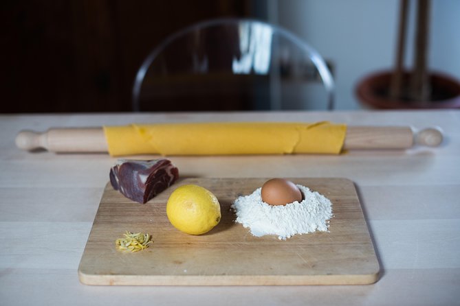 Share Your Pasta Love in a Local’s Home in Venice - The meal at the table: wine, the pasta you made, and optional dessert