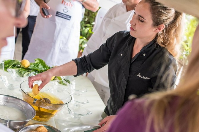 Sorrento: Hands-On Pasta, Tiramisu & Limoncello Fun Class - Entering the class at Piazza Torquato Tasso, then heading out